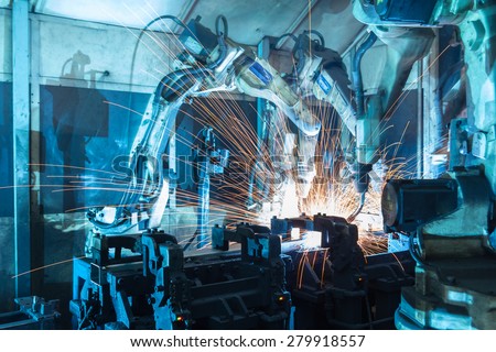 Welding-robot technology working and making a lot of sparks