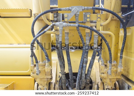Hydraulic hose at tractor for background texture