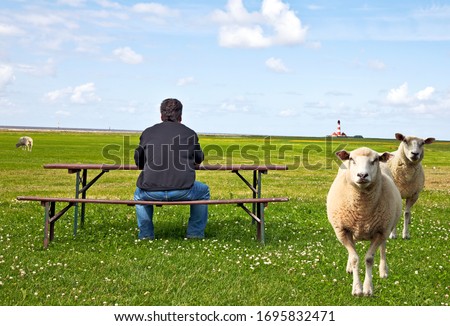 Similar – Foto Bild Leuchtturm Westerhever hinter den Dünen von St. Peter-Ording