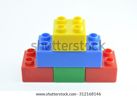 Toy Plastic Building Blocks for children . Focus on near edge of bricks with selective focus.