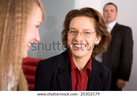 Middle Aged Manager at meeting