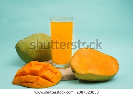 Mango drink on round tray with mango fruit on blue background Stok fotoğraf © 