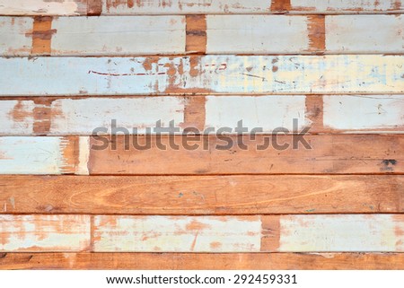 Colorful old grunge wooden background with horizontal stripes. Vintage old backdrop. Vintage effect.