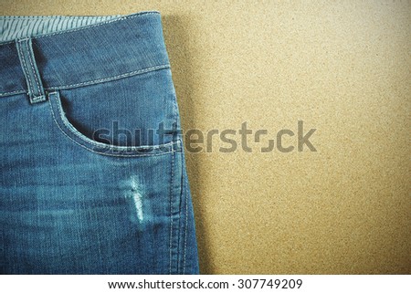 Jeans pocket with copy-space. Toned image.