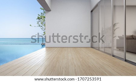 Empty terrace floor near living room and white wall in modern beach house or luxury pool villa. Wooden deck 3d rendering with sea view.