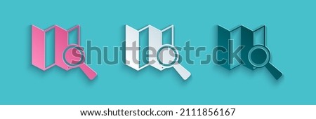 Paper cut Search location icon isolated on blue background. Magnifying glass with pointer sign. Paper art style. Vector