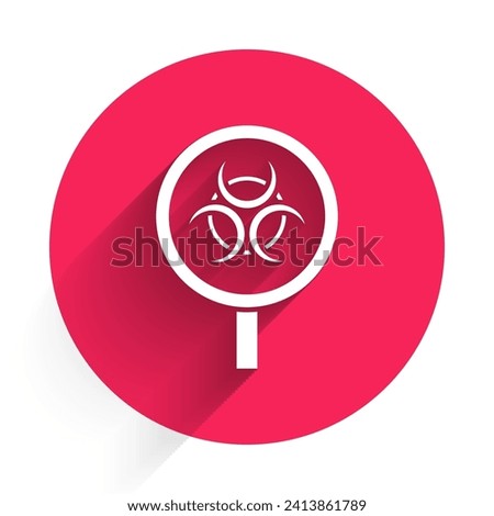 White Biohazard and magnifying glass icon isolated with long shadow. Red circle button. Vector