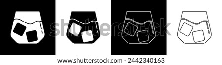 Set Glass of whiskey and ice cubes icon isolated on black and white background.  Vector