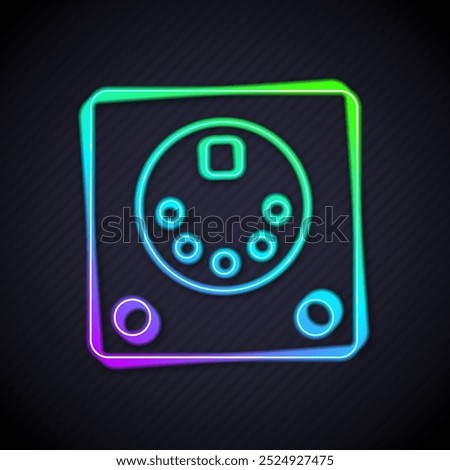 Glowing neon line Drum machine icon isolated on black background. Musical equipment.  Vector