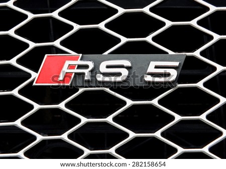 SZCZECIN, POLAND - May 16, 2015: Logo of Audi RS5 - sporty top version of the Audi A5 produced by Volkswagen AG under the brand Audi since 2010.