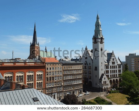 SZCZECIN, POLAND - June 5, 215: Buildings of Pomeranian Medical University - public medical college and Cathedral of St. James.