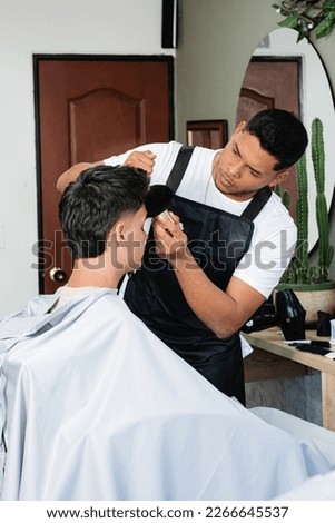 Similar – Image, Stock Photo Young hispanic men doing acrobatics near to a pink wall on the street