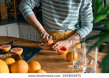 Similar – Image, Stock Photo Anonymous person preparing homemade lemon cake