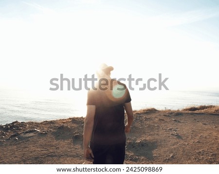 Similar – Boy walking in water of lake