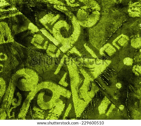 Velvet velor cloth background with abstract ornament. Background for theater and fashion design themes.