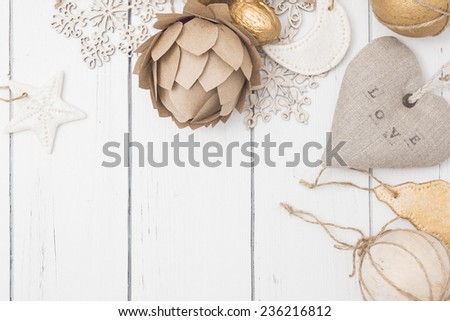 Winter cozy christmas background - decorative wooden snowflakes on a white wooden background shabby chic style