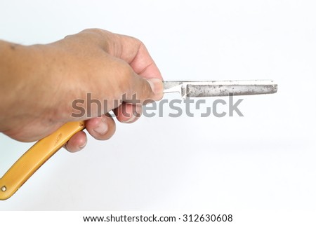 Vintage shaving blade isolated on white background