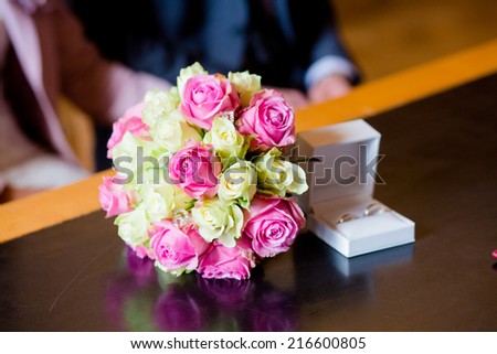 groom bride bouquet flowers wedding rings
