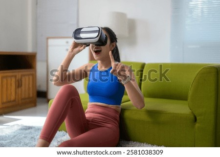 Similar – Image, Stock Photo Sportswoman in headset using social media on smartphone after workout