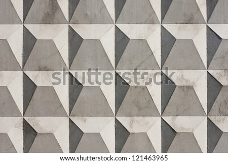 Fragment of concrete slab with a regular prismatic pattern