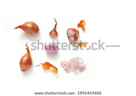 whole and cut shallot on white background. Top view layout Foto d'archivio © 