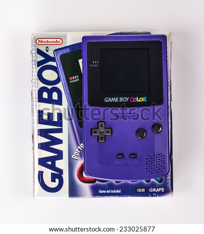 SAINT-PETERSBURG, RUSSIA - November 24, 2014: A studio shot of a Nintendo Game Boy Color on the box. A popular handheld video game device.
