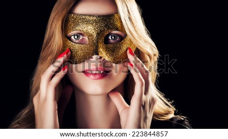 Blond Woman with Golden Mask in Low Key