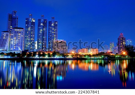 Bangkok, Thailand at Blue hour, Glittering lights and tallest skyscrapers during a clear evening with Blue sky.