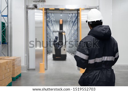 Staff worker control in freezing room or warehouse Stock foto © 