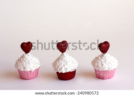 Valentine background; Valentine cupcakes on white background