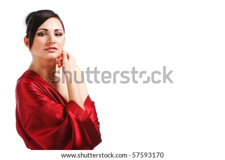 Picture of charming young woman in red gown on white background.