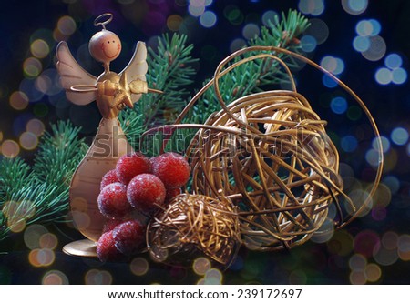 Christmas wooden angel with red and golden decoration