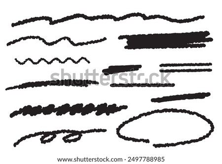 Handwritten lines of black crayon or chalk