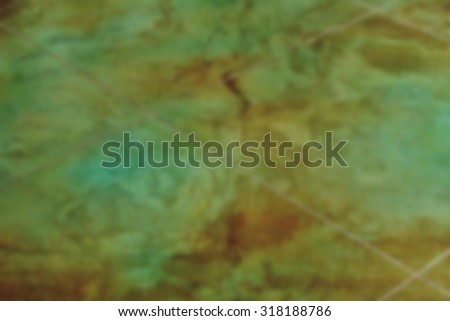 textured cement flooring  wall color  background blur used to decorate.