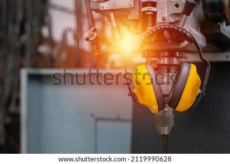 Similar – Image, Stock Photo Working sound engineer wearing headphone in home studio.