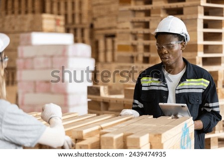 Similar – Image, Stock Photo Craftsman milling lumber using machine in carpentry workroom