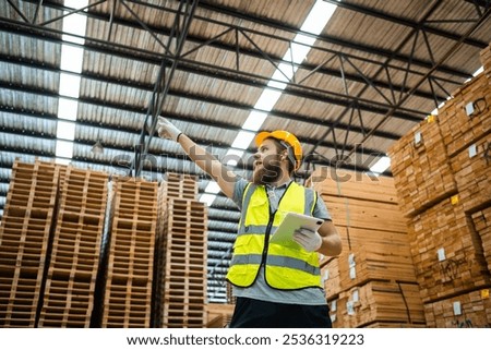 Similar – Image, Stock Photo Craftsman milling lumber using machine in carpentry workroom