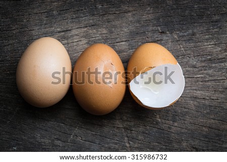 Three eggs kind on wooden,egg,crack egg,cracked egg