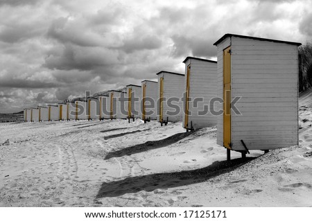 Small wooden houses on the beach for changing clothes.
