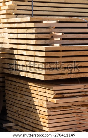 big pile of lumber, edge board for the construction site