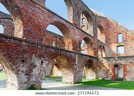 red brick ruin with arches of a monastery building in Bad Doberan, Northern Germany