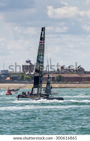 PORTSMOUTH, UK - JULY 25: The UK Team Land Rover BAR America\'s Cup boat sailing in the America\'s Cup World Series qualifiers in Portsmouth shown on July 25, 2015 in Portsmouth, UK