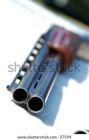 close up of over under 12 gauge skeet gun