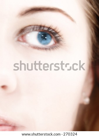 Close up of a blue eyed womans face