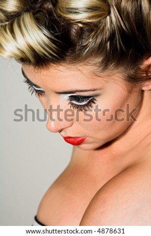 Close up portrait of a couture model in runway makeup