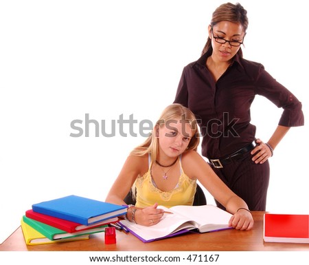 August means Back To School,  Teacher and student share some one on one instruction time in a classroom environment  isolated over white.