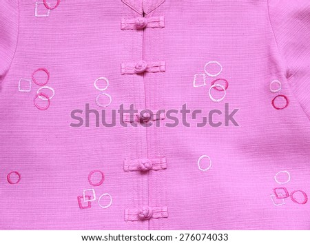 Close up pink shirt shirt button