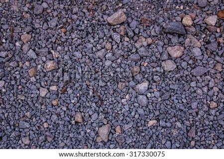 Differents rocks in the street of differents sizes