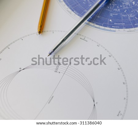 Pens and star galatic map on the school or college table for students