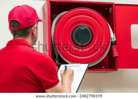 Similar – Image, Stock Photo Fire hydrants at the corrugated wall and door